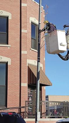 NPPD crew ws busy last Fridy Instaling Holiday Lights in Pawnee City. Just in time for the firts snow of the year.
