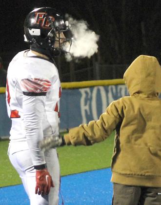 IT WAS THAT COLD – Pawnee City’s Andy Maloley’s breath (left) shows you just how cold it was at the Class D6 State Football Championships. Paula Jasa/Republican