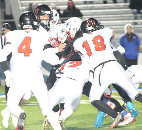 Pawnee City’s Jett Farwell (#4, left), Andy Maloley (#12, center) and Hunter Johnson (#18, right) get in on a tackle against Parkview on Friday night. Paula Jasa/Republican