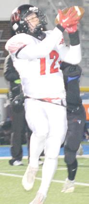 Pawnee City’s Andy Maloley (#12) catches the Indians’ first touchdown pass in the 2nd quarter for 40 yards. Paula Jasa/Republican