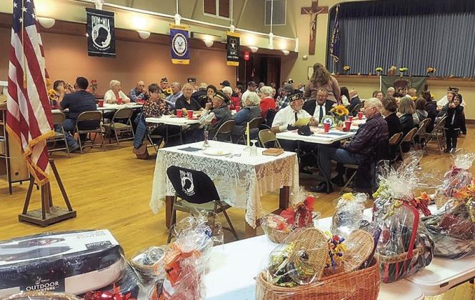 Guests, some of the door prizes contributed by the Legion Auxiliary in the