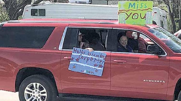 Pictures left to right top to bottom: Social distancing through windows, garden work, May Day baskets, chalk art, crafts for smiles, virtual Easter Egg Hunt egg, garden west side, and family drive by parade.