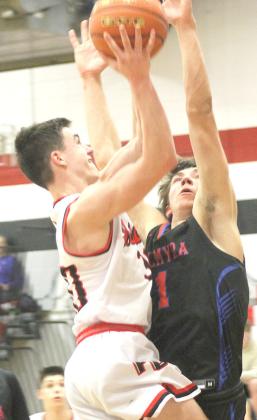 P.C.’s Jett Farwell drives the lane for two points. Jett scored 27 points against Palmyra Paula Jasa/Republican