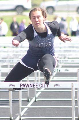 HTRS’ Natalie Novak clears her final hurdles of the 100 M. event and places 2nd at 17.94. Paula Jasa/Republican