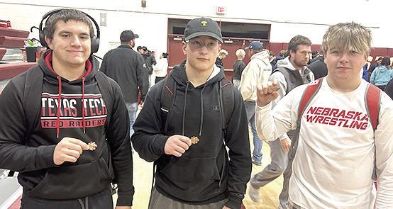 Pictured are Pawnee City wrestlers who claimed 3rd place medals in their respective divisions at the Conestoga Classic on Saturday. From left are: Dylan Layne, Jesse McLaughlin and Gauge Shuetz. Photo courtesy of Jamie Maloley
