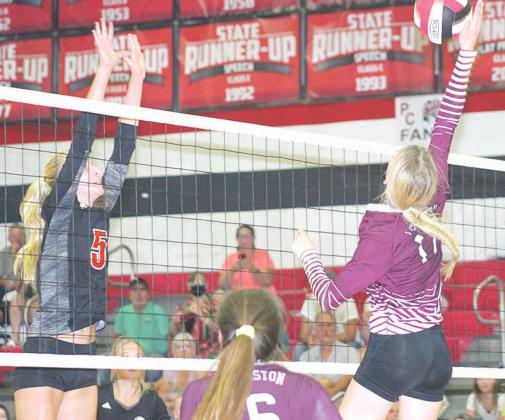 Lewiston’s Meagan Sanders (#17, right) launches an attack against P.C.’s Sierra deKoning (#5, left) as LHS’ Jaque Mullins (#6) looks on. Paula Jasa/Republican