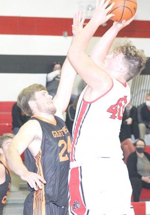 P.C’s Simon Osborne (#40, right) goes up tough down low against Diller/Odell in the Indian’s home opener. Osborne led the Indians with 9 point in the game. Paula Jasa/Republican