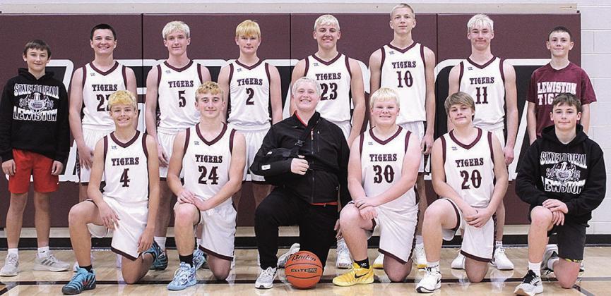 Members of the 2025-26 Lewiston Boys’ Basketball Team are front, from left: Ethan McEvers, Tristen Wagner, Brody Wright, Taven Borcher, Jacob Burns, Dalton Heideman. Second row: Braxton Houseman, Colter Steinacher, Grady Weyers, Cashton Steinacher, Brock Janssen, Chase Rule, Payton Heidemen, Owen Wehrbein. Not pictured: Axel Seeman, Head Coach Kyle Asche, Asst. Coach Treyton Hippen, Asst. Coach Andrew Paquette.