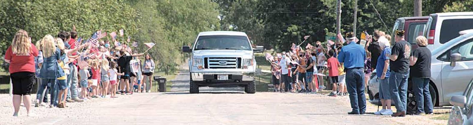 Sgt. Dustin Brethouwer comes up the street to a hero’s welcome. Ray Kappel/Republican