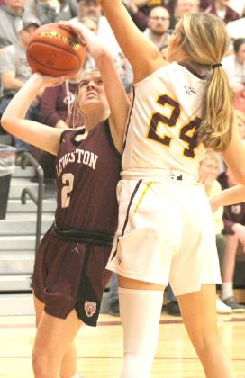 LHS’ Jenna Anderson (#2, left) goes up strong against a Sterling defender. Paula Jasa/Republican