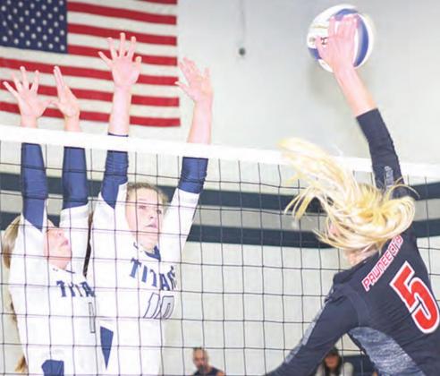 HTRS’ Laramie Glathar sets up the Lady Titans’ offense (above right) as P.C.’s Hallye Friedly (#8) goes up for the block. Pictured right, HTRS’ Glathar and Jacey Leech (#10) go up for the block as P.C.’s Sierra deKoning (#5) lands a kill. Paula Jasa/Republican