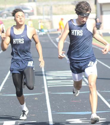 HTRS’ Nic Knudson (right) and JJ McQueen (left) finish 5th and 6th in the 200 M. Dash at the Lewiston Invitational. Nic had a time of 24.93 while JJ had a 25.25. Paula Jasa/Republican