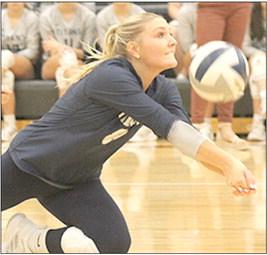 HTRS’ Jaylee McNealy goes after a dig against E-MF in the 3rd place Pioneer game. McNealy had 12 digs in the Lady Titans’ four set win over the Lady Bobcats. Paula Jasa/Republican