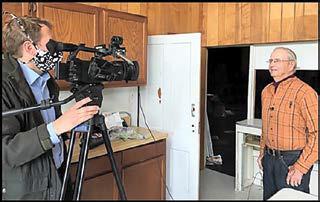 Milan Tomek in 2019, being interviewed by Jon Vanderford, of the popular television program Pure Nebraska, about memories of the old Legion Hall building.