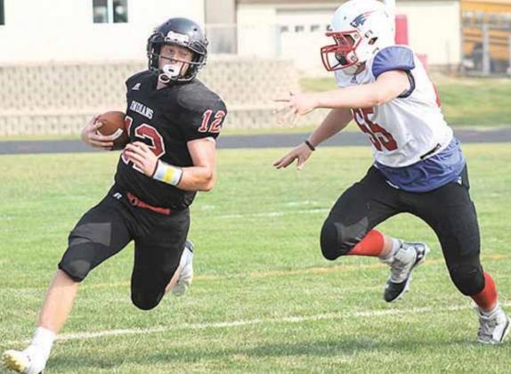 Pawnee City’s Jacob Andy Maloley (#12) evades a Parkview Christian tackler. Paula Jasa/Republican