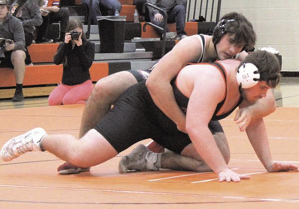 Pawnee City Indian Dylan Layne resets to go another round against Falls City Tiger Chase Simpson