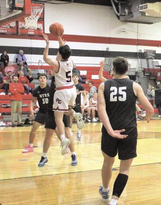 Pawnee City Indian Jordan Wernimont jumps to score