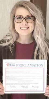 Nicole Wilkin with proclamation