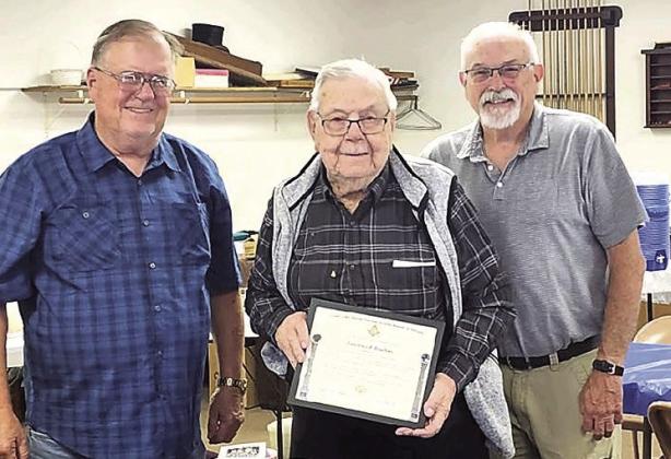 Pictured Above: Larry Bradbury, Lawrence Bradbury and Charlie Hatfield.