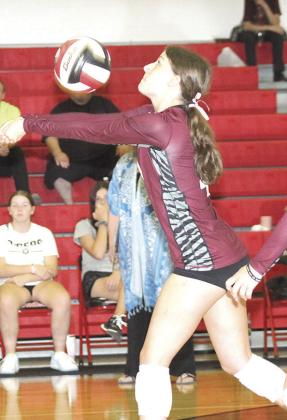 LHS’ Savannah Cutshall passes the ball to the front row on serve receive against Pawnee City. Paula Jasa/Republican