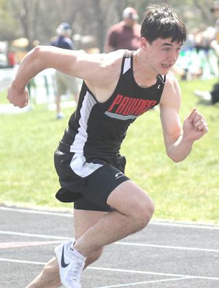 P.C.’s Jett Farwell gets out of the blocks quickly in the 400 M. Dash. Farwell won both the 400 and 800 M. events with times of 52.87 and 2:06.14. Paula Jasa/Republican