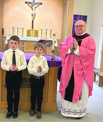 Sacred Heart - Blaine Sisco, Aaron Sisco and Father Christensen.