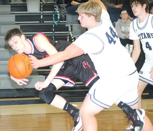 P.C.’s Brysen Horst (left) tries to save a ball as HTRS’ Ryken Davis (#44, right) defends and Jack Hunzeker (#4) looks on. Paula Jasa/Republican