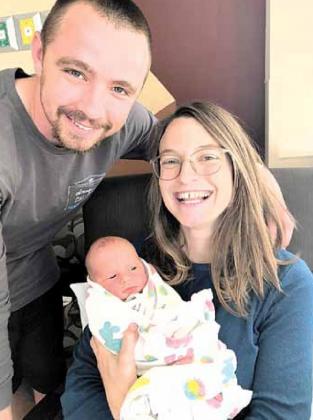 Kent Niss with wife Katie and Eleanor.