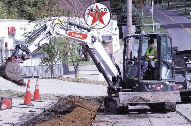 Men At Work: Parking Lot Addition