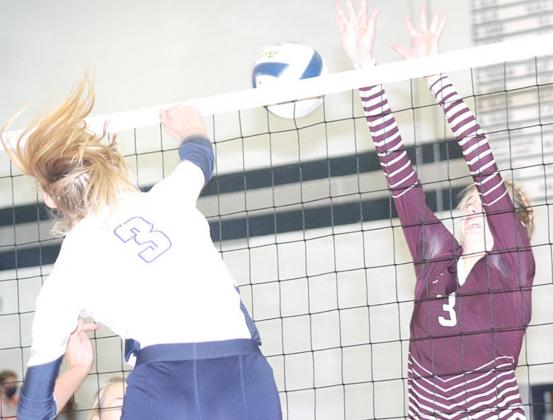 HTRS’ Abby Stalder (#3) puts down a spike past Lewiston’s Katelyn Sanders (#3) in last week’s Tuesday night action. HTRS won the meeting in three sets. Paula Jasa/Republican