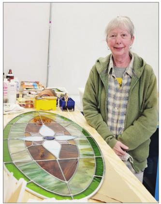 Deb Costello pictured with some of the work offered with her classes