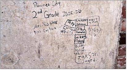 The Pawnee City 2nd Grade signed the wall, keeping the tradition alive!