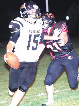 P.C.’s Clayton Shook (#21, right) chases down the McCool Junction ball-carrier late in the game which resulted in a turnover on downs for the Indians Paula Jasa/Republican