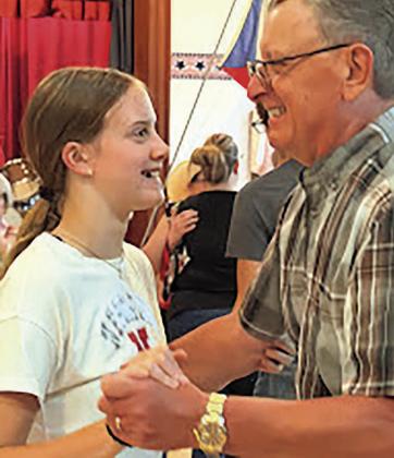 Breena Haug of Centralia, KS dancing with grandpa Alan Fritch of Valparaiso, NE Photo courtesy of Sharla Sitzman