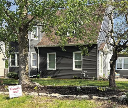 The first home to receive a Pawnee City Proud sign this summer, is the home of Russ and Kate Weeks. The Weeks family has spent hours remodeling their home, putting up a new garage building, and landscaping their yard! It all looks wonderful! Thank you for helping our community look its best!