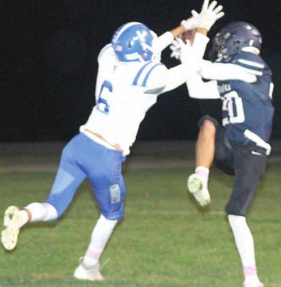 HTRS’ Nic Knudson (#20, right) makes a tough touchdown catch in traffic in the first half against NCL. Paula Jasa/Republican