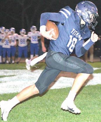 HTRS’ Brandt Leech (#18) takes off on a run in the 2nd quarter. He had 10 carries for 54 yards against NCL. Paula Jasa/Republican