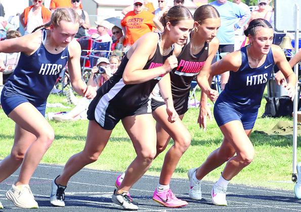 HTRS’ Lillian Bowen (right) jumps out in the 800 M. Run with teammate Grayson Sherman (far left) and Pawnee City’s (from right) Kinsley Benson and Logan Maloley. Jasa/Republican
