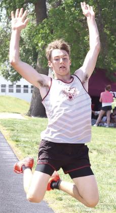 LHS’ Payton Heideman tries to get some extra leverage in the Boys’ Long Jump event.