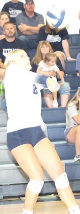 HTRS’ Jaylie McNealy (#8) handles a tough serve receive. Paula Jasa/Republican