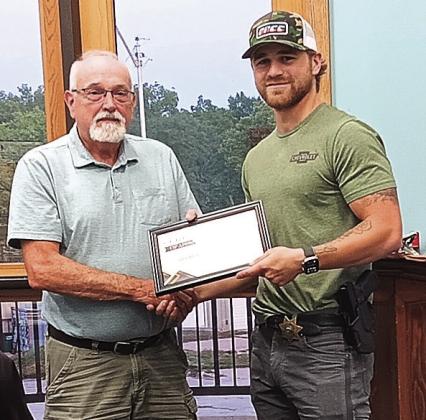 Mayor Hatfield hands Deputy Stankoski a Certificate of Appreciation photo by Reagan Connelly