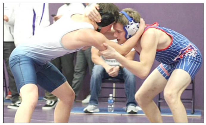 CORRECTION - HTRS/P.C.’s Jesse McLauglin (left) goes toe to toe with an opponent at the Louisville Invite. photo courtesy of Shane Maloley