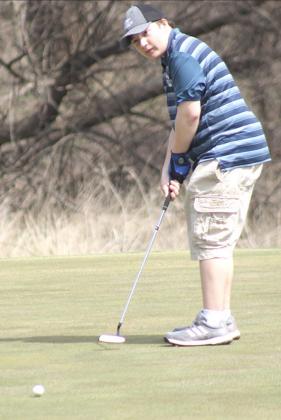 HTRS/P.C.’s Carson Refsdal watches his par putt come up just short of the cup on #3. Refsdal shot rounds of 48,55 for a 103 and placed 9th at the HTRS Invite. Paula Jasa/Republican
