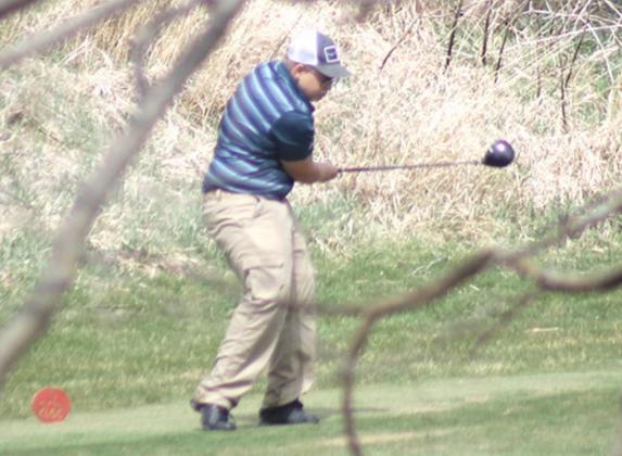 HTRS/P.C.’s River McNeely swings away on the #6 tee box in the J-V competition on Tuesday. Paula Jasa/Republican