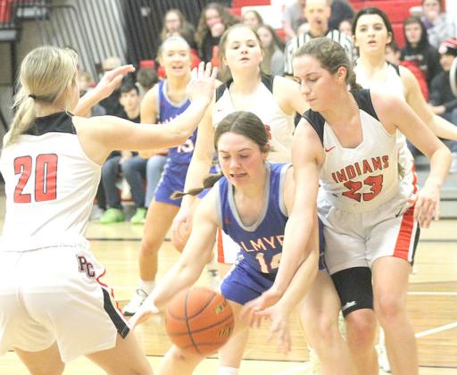 P.C.’s Madison Fender (#20, left) and Madison Lytle (#23, right) defend the paint against Palmyra on Thursday night. Paula Jasa/Republican