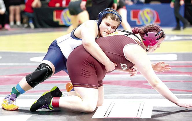 Photo courtesy of Lorrie Novak HTRS’ Ava Grimes (on top) at the start of the 2nd period in her Consolation match against Allee Jo Inzauro of Conestoga. Ava pinned her in 2:52.