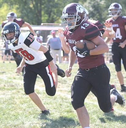 Lewiston’s Brady Bledsaw (#13, right) rushed for 211 yards for the Tigers against Meridian. Paula Jasa/Republican