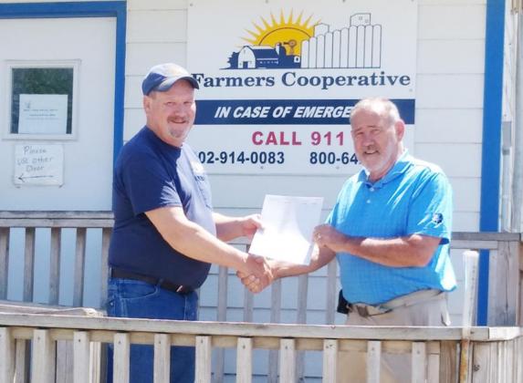 FARMERS COOPERATIVE DONATES TO PAWNEE COUNTY AG SOCIETY