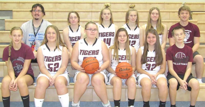 Members of the 2020-21 Lewiston Girls’ Basketball Team are front, from left: Maddie Janssen, SM, Becca deKoning, Jaszmyne Charles, Masyn Arena, Leah Christen, Ashton Sanders, SM. Back Row: Asst. Coach Alex Callan, Carleigh Weyers, Meagan Sanders, Katelyn Sanders, Emma deKoning, Head Coach Schuyler Kuhlmann.