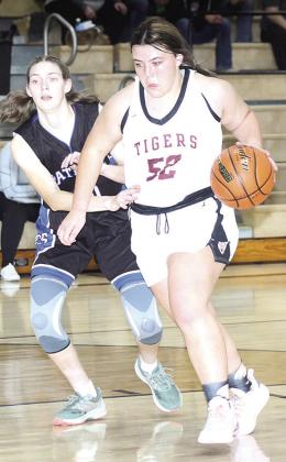 LHS’ Bryleigh Crouse (#52, right) drives past a Parkview Christian defender in Thursday night’s game. Paula Jasa/Republican